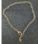 hypo-allergenic- silver cross chain anklet on denim