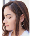 dark hair model with sterling hoop crystal earrings