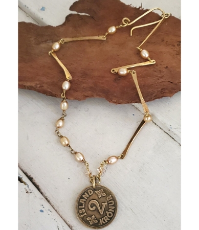 1941 Iceland coin necklace with pearls on wood