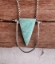 soothing amazonite pendant silver U fame necklace on wood