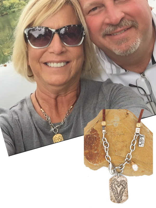 heart necklace worn of female with her hubby