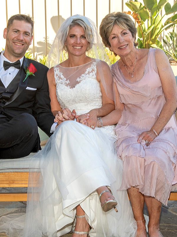 bride groom & wedding officiate with custom jewelry