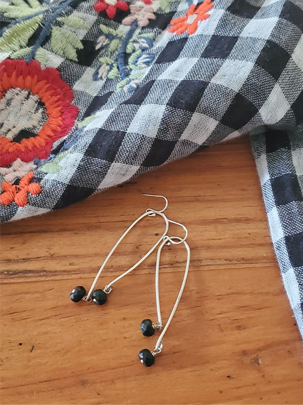 elongated abstract silver and black earrings