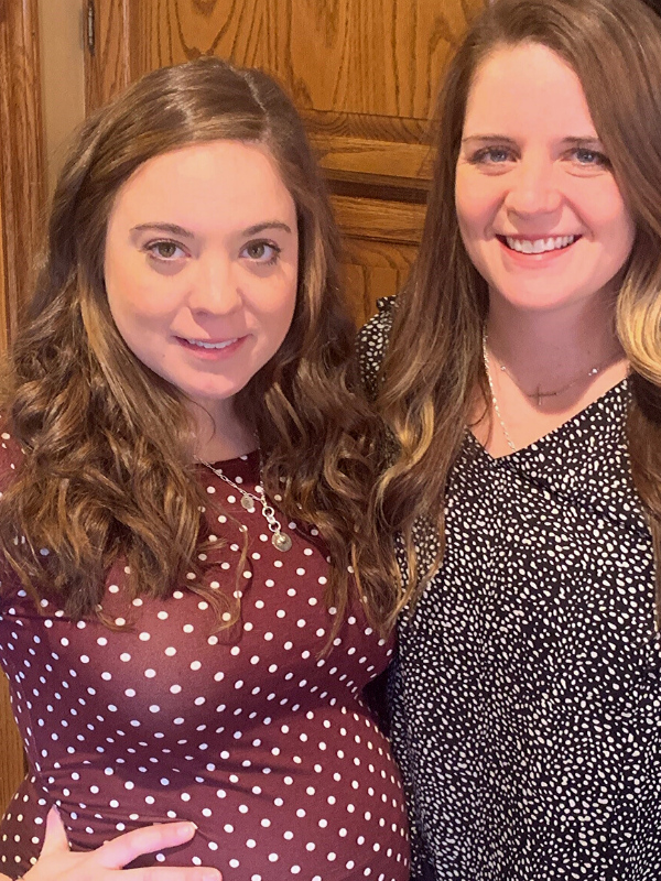 2 moms wearing new mom jewelry