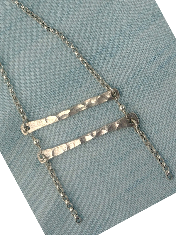 hammered sterling bar necklace on denim