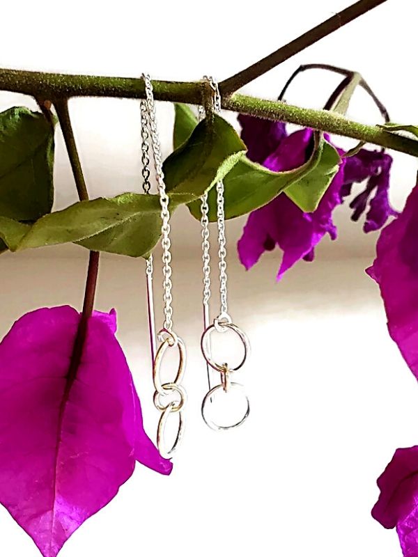 purple flowers with silver ear threads