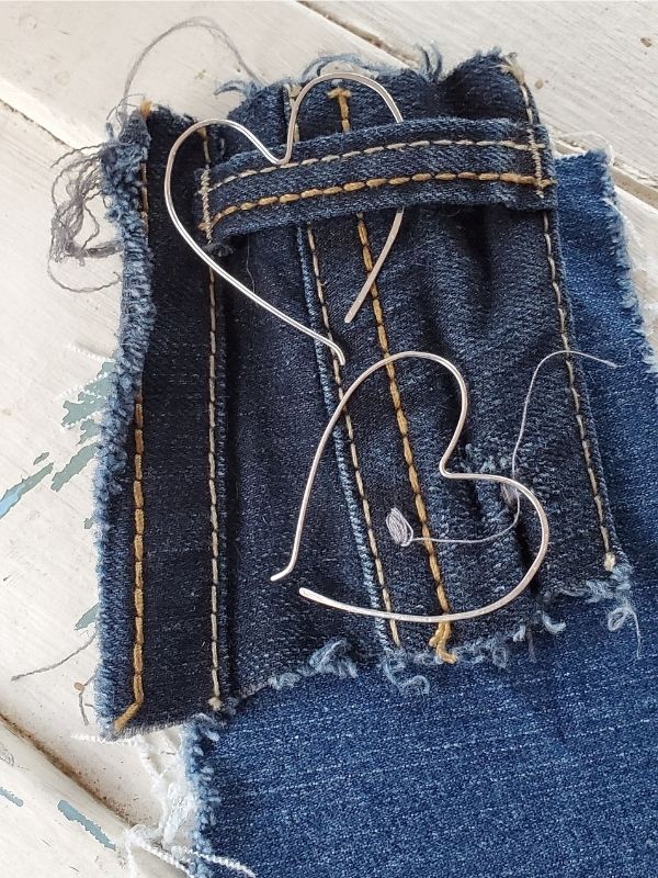 silver heart earrings with denim