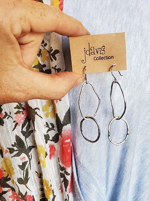 organic shape silver earrings with outfit