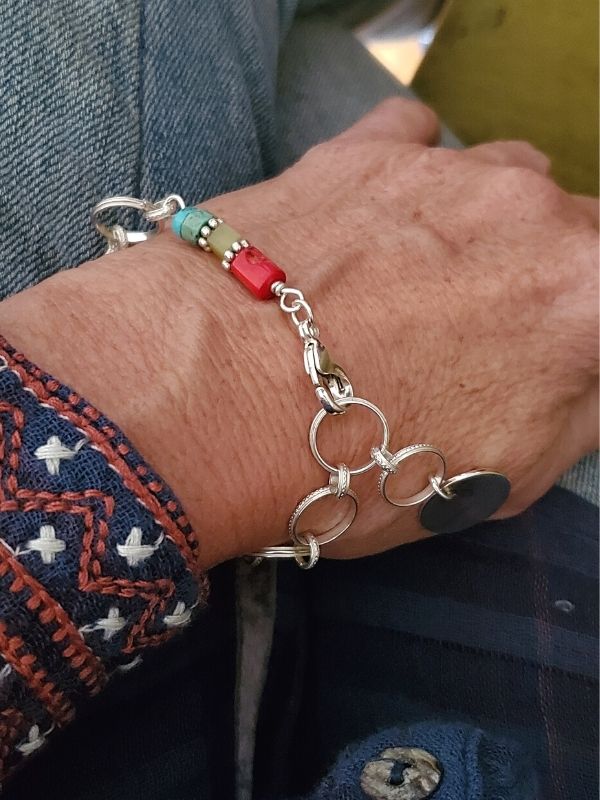 turquoise gemstone charm bracelet on wrist