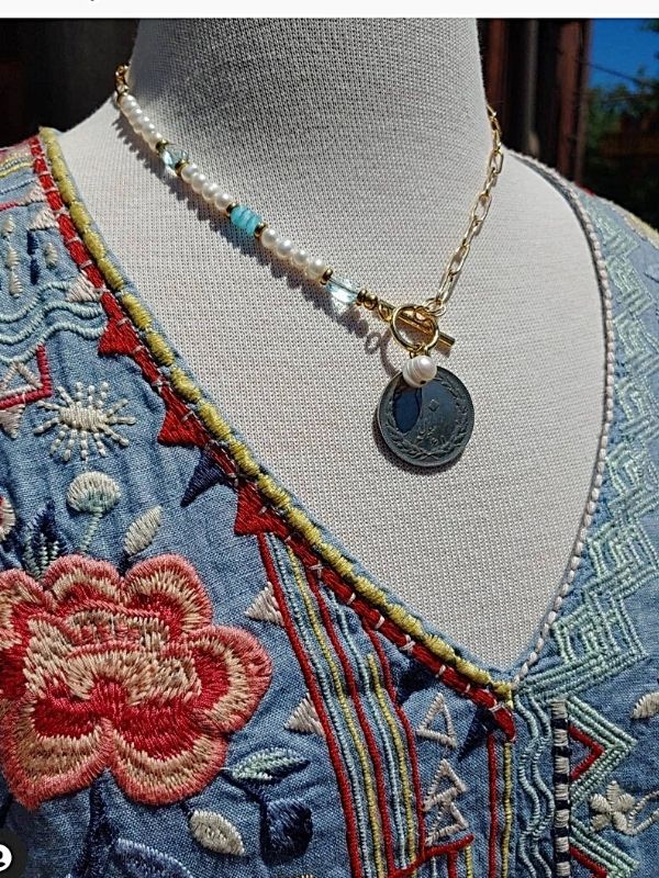 coin necklace on mannequin with Johnny Was dress