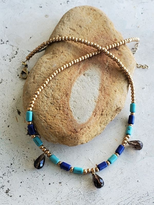  earthy beaded necklace on rock