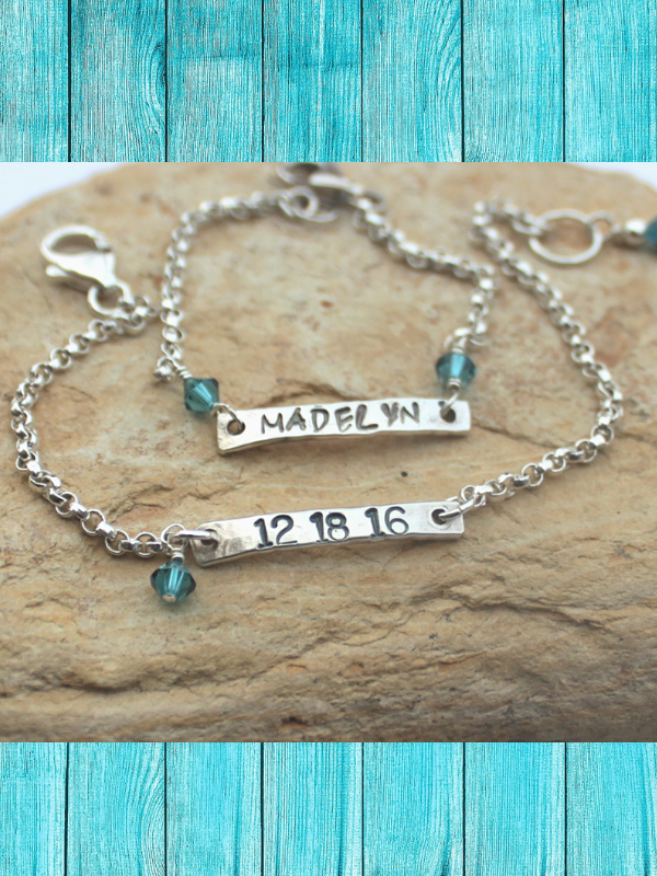 mommy & me sterling bracelets on rock teal wood