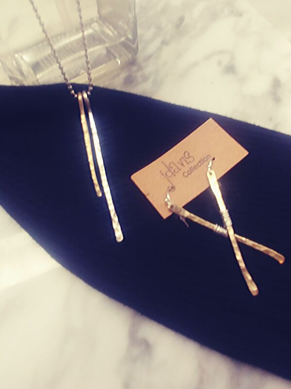 silver gold stick jewelry on black