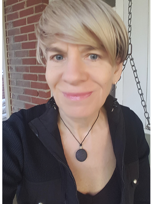 bir round black stone necklace worn with all black clothes